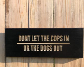 Painted Wood Sign: "Don't Let The Cops In Or The Dogs Out" - 16x6 Inch
