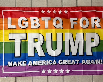 May include: A rainbow flag with the text "LGBTQ FOR TRUMP MAKE AMERICA GREAT AGAIN!" printed on it.