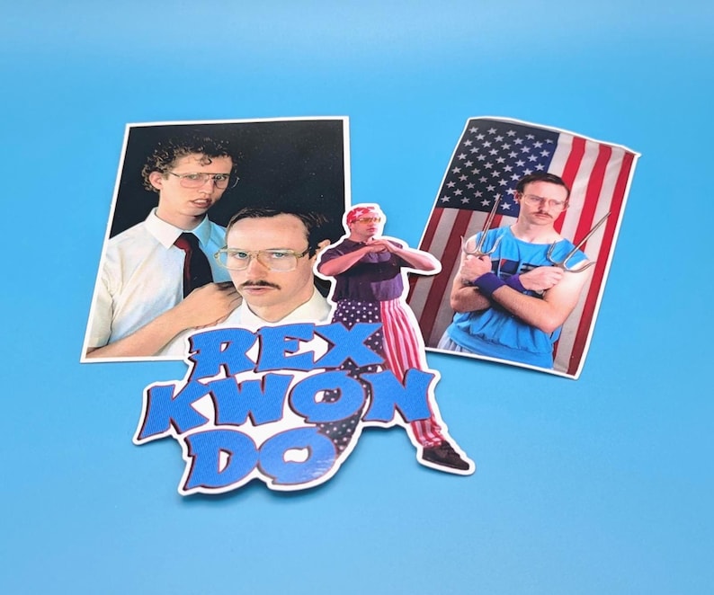 May include: Three stickers featuring characters from the movie 'Dodgeball'. The first sticker shows a man with curly hair wearing a white shirt and a tie. The second sticker shows a man wearing a red, white, and blue bandana and a blue shirt. The third sticker shows a man wearing a blue shirt and holding two nunchucks. The stickers are arranged in a triangle shape with the text 'Rex Kwon Do' in blue and white letters in the center.