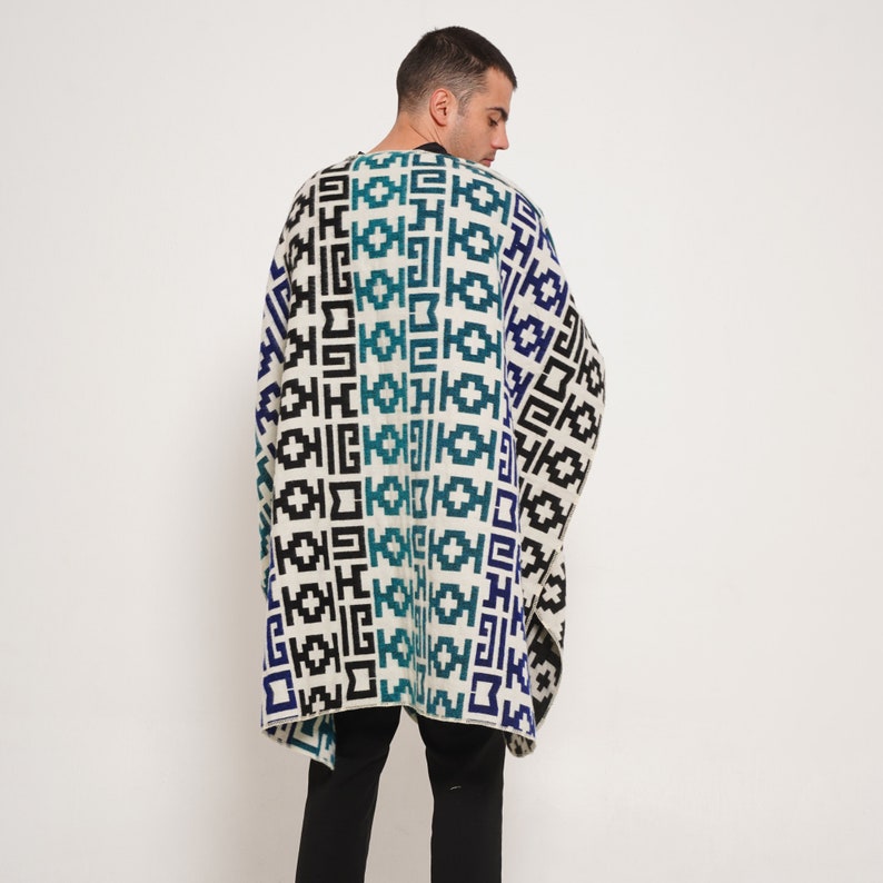 Elevate your style with our Closed Oversized Unisex Poncho. Fashion meets comfort in this lightweight, hypoallergenic design, perfect for all seasons. Ethically crafted with vegan materials