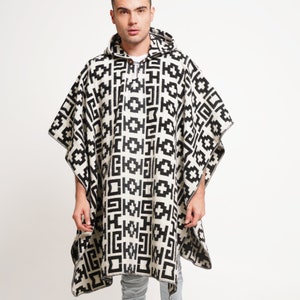 Elevate your style with our Closed Oversized Unisex Poncho. Fashion meets comfort in this lightweight, hypoallergenic design, perfect for all seasons. Ethically crafted with vegan materials