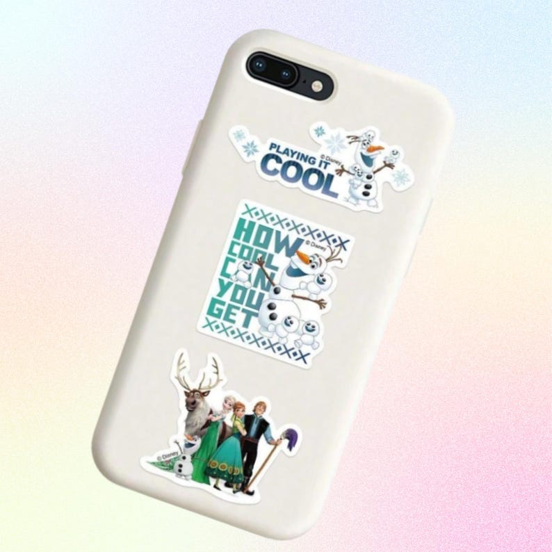 May include: A white smartphone case decorated with three Disney Frozen stickers. One sticker reads PLAYING IT COOL with Olaf, another says HOW COOL CAN YOU GET with Olaf and Snowgies, and the third features Anna, Elsa, Kristoff, Sven, and Olaf.