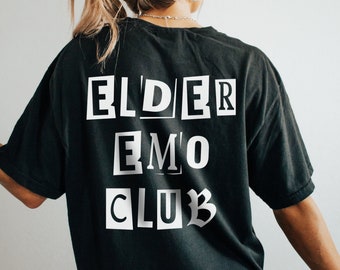 May include: Black t-shirt with white text that reads "ELDER EMO CLUB" in a cut-out style font.