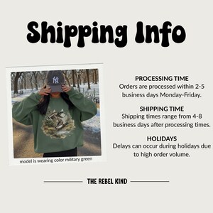May include: A military green sweatshirt with a nature scene graphic. The sweatshirt is paired with a baseball cap. The text "THE REBEL KIND" is at the bottom of the image.