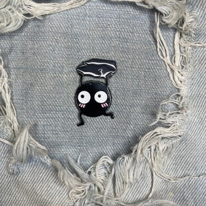 Soot Spirit running with coal spirit world anime enamel pin