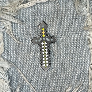 Pixel block sword game enamel pin
