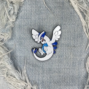 White and blue dragon water type fantasy creature Pin badge