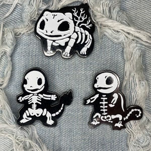 Three 3 X-ray skeleton creatures water earth fire Halloween spooky pin badge