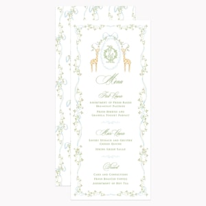 May include: A vertical white menu card featuring a light blue bow, two orange giraffes, and a green floral wreath surrounding a monogram. The text includes Menu, First Course, Main Course, and Dessert with listed food items in green script and print.