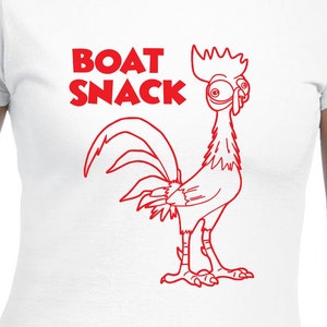 May include: White t-shirt with a red outline of a rooster and the text "BOAT SNACK" in red.