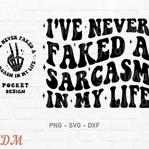 May include: Black and white graphic design with the text "I've never faked a sarcasm in my life". The text is in a retro font style. There is a smaller graphic of a skeleton hand making a peace sign inside a circle with the text "I've never faked a sarcasm in my life".