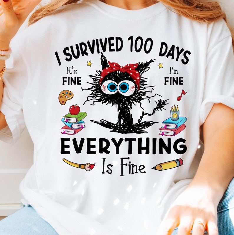 May include: White t-shirt with a black cat illustration and the text "I survived 100 days. It's fine. I'm fine. Everything is fine."