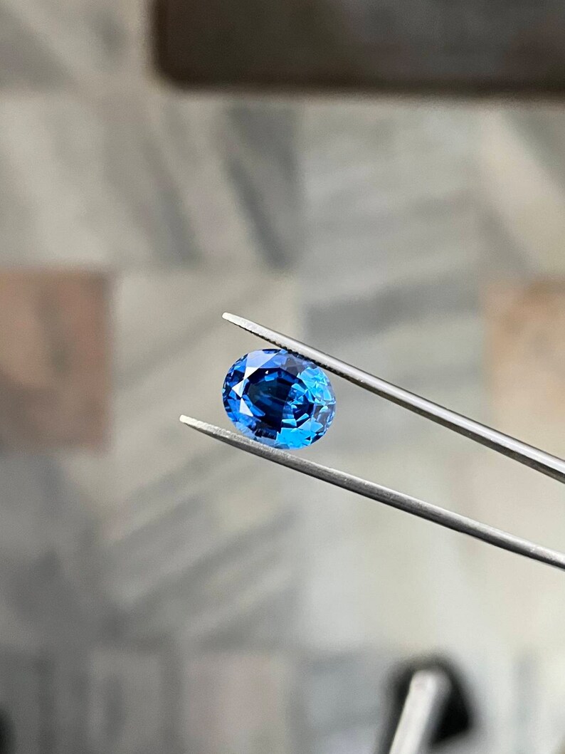 In het lab gemaakte Ceylonblauwe saffier, ovaal geslepen, gefacetteerde saffier, losse edelsteen, uitstekende fabricage, blauwe saffier voor het maken van sieraden afbeelding 3