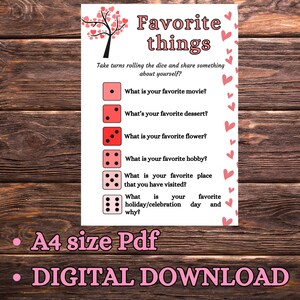 May include: A printable game card with a pink heart tree and the text "Favorite things". The card has a dice roll game with questions like "What is your favorite movie?" and "What is your favorite hobby?" The card is labeled "A4 size Pdf" and "DIGITAL DOWNLOAD".