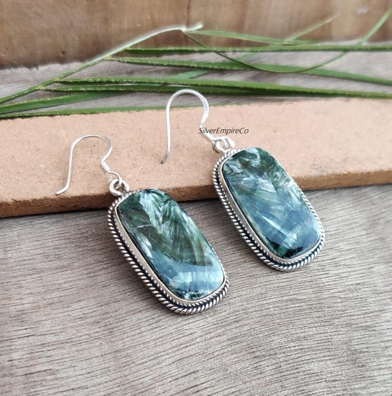 Orecchini in argento con peridoto in vendita su