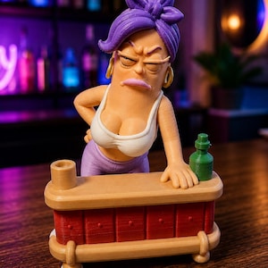 May include: A 3D printed figurine of a character with purple hair in a bun, wearing a white tank top and gold hoop earrings, leaning over a red and tan bar counter. A small green bottle sits on the counter next to the character's hand.