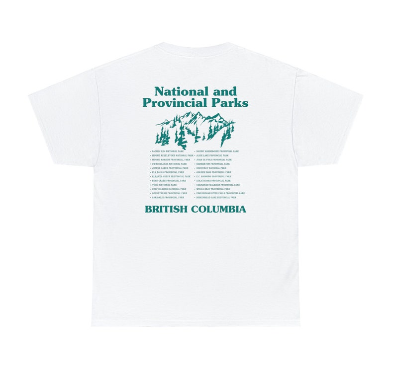 May include: White t-shirt with a teal graphic featuring the text "National and Provincial Parks" above a mountain and tree illustration. Below, the text "British Columbia" is printed. A list of parks is printed below the mountain graphic.