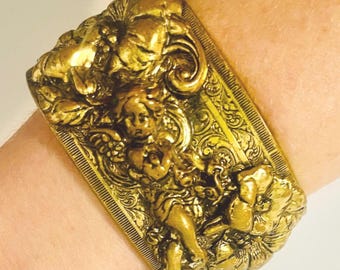 Hinged Width Vintage Ornate Gilt Brass Cherub and Floral Relief Style Wide Bangle Bracelet