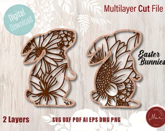 May include: Two-layer digital cut file design for an Easter bunny with a floral pattern. The design is available in SVG, DXF, PDF, AI, EPS, DWG, and PNG formats.
