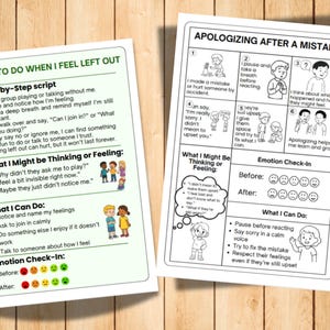 May include: Two educational worksheets on a wooden surface. One titled "What to Do When I Feel Left Out" and the other "Apologizing After a Mistake." Both feature text and illustrations to help children with social skills.
