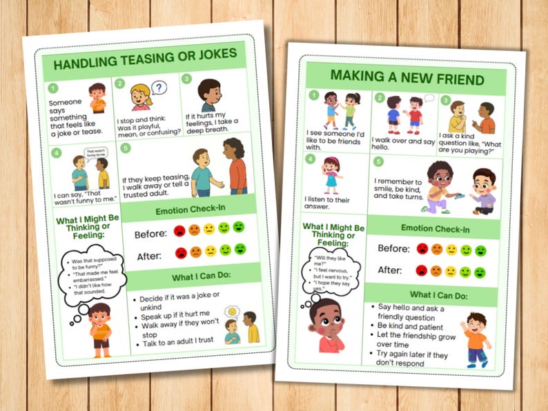 May include: Two educational posters on a wooden surface. One poster is titled "Handling Teasing or Jokes" and the other is "Making a New Friend." Each poster features illustrated steps and emotion check-ins.