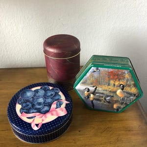 Three Small Storage Cans