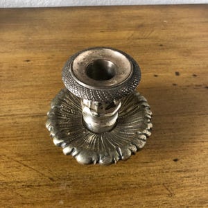 One metal candle holder