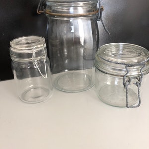 Three Vintage Glass Canisters With Wire Closureshoe