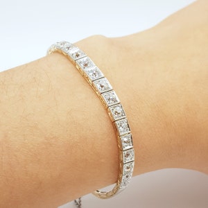 French Rivièr antique bracelet with old-cut diamonds made of 585 yellow gold and platinum