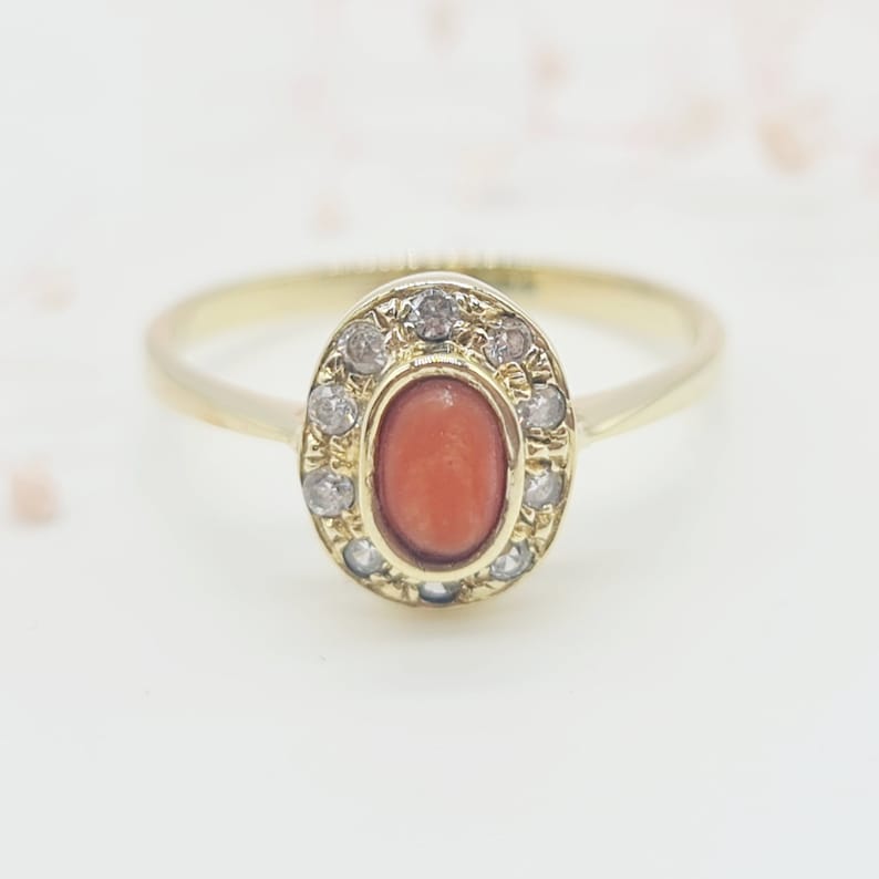 Exquisite vintage ring made of 585 yellow gold with coral cabochon and zirconia stones image 1