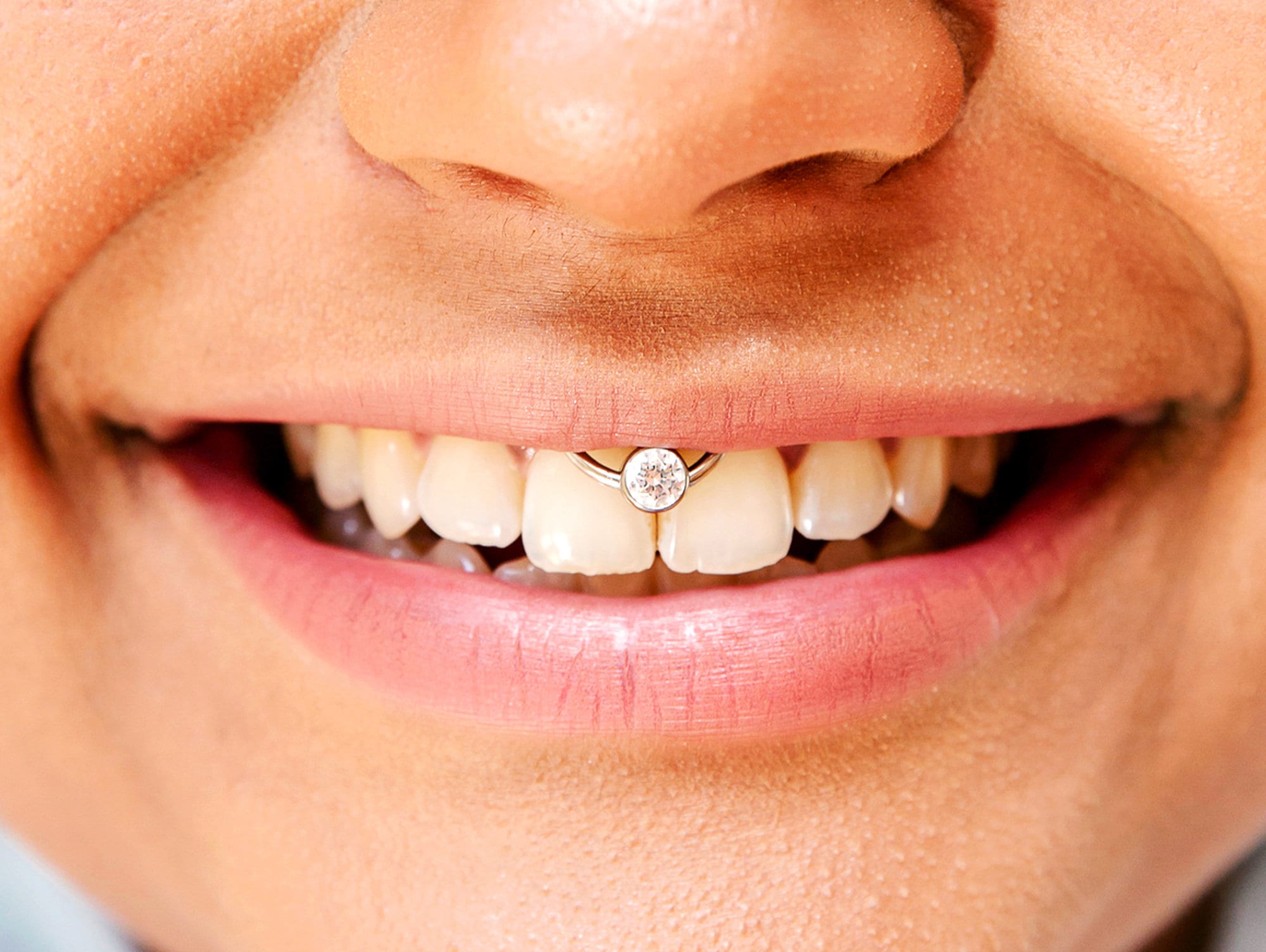 Smiley piercing captive store bead ring