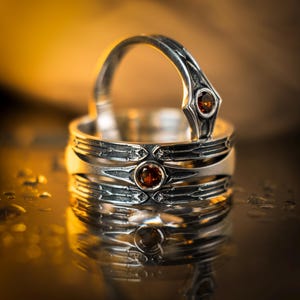 Sculpted with ornate detail, this ring is perfect as a statement piece or layered with other meaningful jewelry. Whether worn as a gift for him, a mystic ring for her, or as part of your personal story, it radiates confidence and individuality.