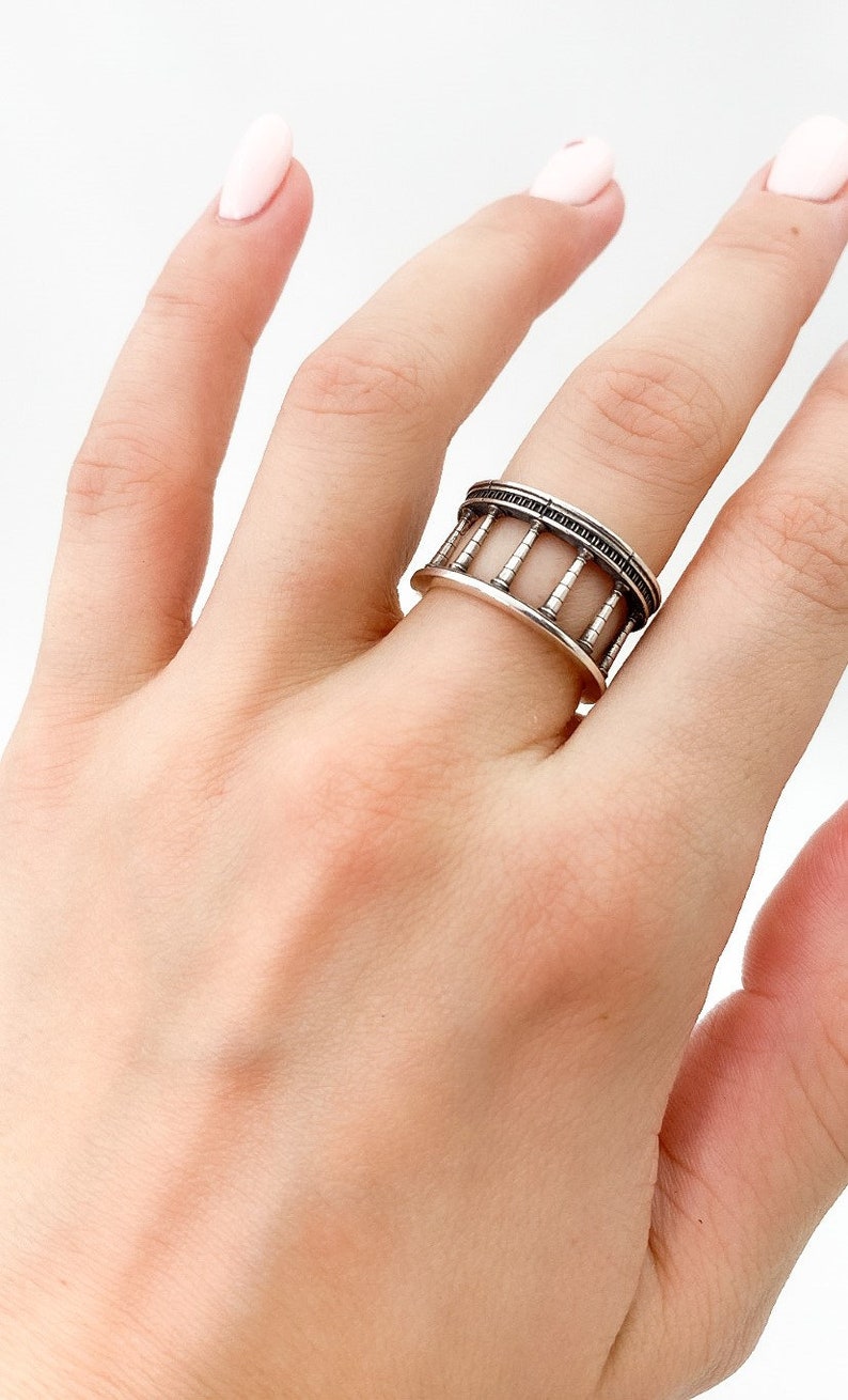 The "Column" ring is perfect for those who appreciate the artistry of architectural design or seek a piece of jewelry that symbolizes strength and resilience.