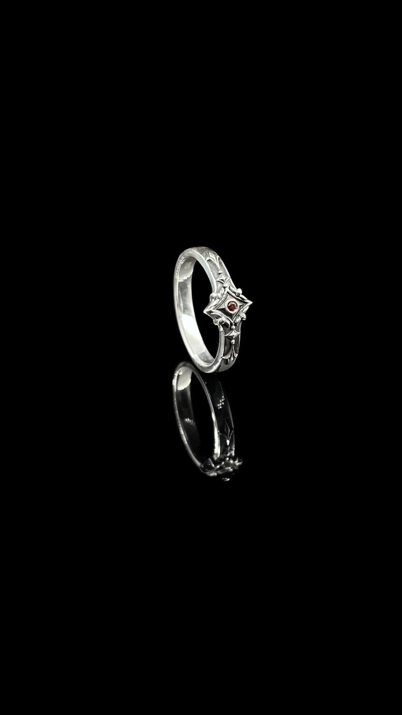 Sterling silver gothic ring with gemstone. Handmade medieval-style jewelry, perfect as a vintage wedding ring or gothic holiday gift.
Gothic Gemstone

Fleur Wedding

Medieval Charm

Custom Gothic

Dark Romance

Silver Promise

Noble Rings

Royal Gothic

Gothic Union

Elegant Gothic