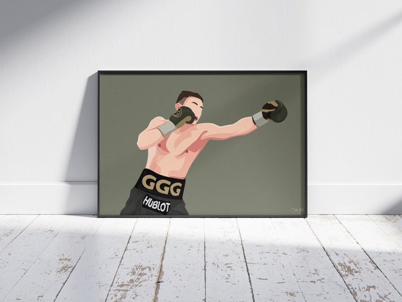 Poster en cadre Beau jeune homme musclé avec des gants de boxe 
