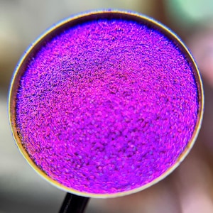 Midnight Violet is a hand pressed extreme multichrome 26mm single eyeshadow