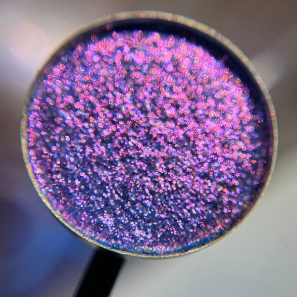 Lavender Disco is a hand pressed extreme multichrome 26mm single eyeshadow topper