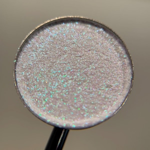 The Moon hand pressed iridescent multichrome shimmer 26mm single eyeshadow topper