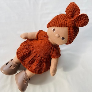 Dinkum doll knitted set, 4 pieces: Dress, socks, panties and headband.