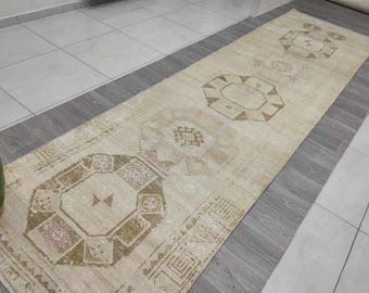 Vintage turkisk ulllöpare: 8,2 x 25 cm bleknad tribal entrématta, anatolisk beige brun matta