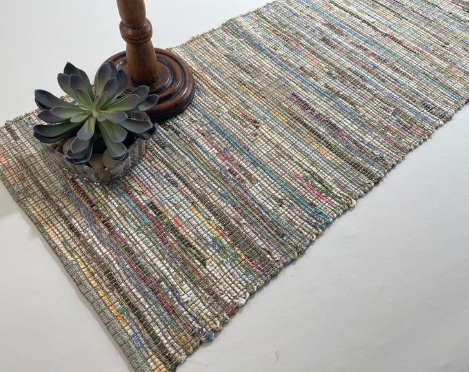 13" wide table runner in ivory based warm earth tones,handwoven using upcycled, eco friendly fabrics. Many length options. Tariff exempt.