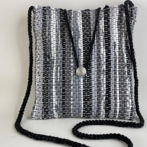 Handwoven shoulder or cross-over bag of upcycled eco friendly cotton blend fabrics. Four color ways. Cotton lining, washable, tariff exempt