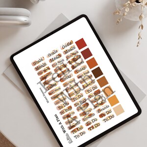 May include: A digital planner with a variety of stickers for organizing tasks, goals, and appointments. The stickers feature a gold and brown marble pattern with black text. The text on the stickers includes "Goals", "Meals", "This Week", "Gratitude", "Finances", "Today", "Next Week", "Remember", "Little Things", "To Do", "To Buy", "Waiting On", "Important", "Errands".