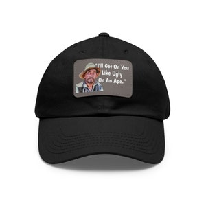 May include: Black baseball cap with a brown patch featuring a man in a hat and the text "I'll Get On You Like Ugly On An Ape."