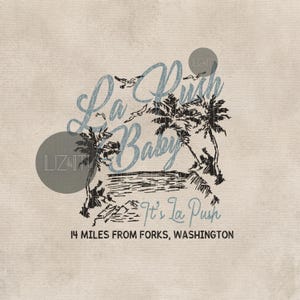 May include: A light beige graphic design featuring the text "La Push Baby" in a stylized script, with palm trees and a beach scene. The phrase "It's La Push" and "14 miles from Forks, Washington" are also included.