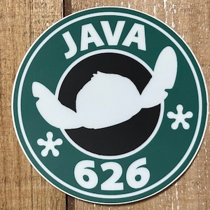 May include: Green and black round sticker with the text "JAVA 626" and a white silhouette of Stitch from Lilo & Stitch.