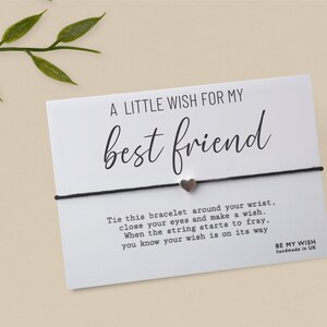 May include: A card with the text "A LITTLE WISH FOR MY best friend" and a black string bracelet with a small silver heart charm. The card includes instructions and the phrase "BE MY WISH handmade in UK."