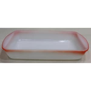 May include: A rectangular white milk glass baking dish featuring a smooth, opaque finish and a distinct orange-red gradient rim that extends along the top edges and rounded corners of the vessel, providing a clean and simple kitchenware design.