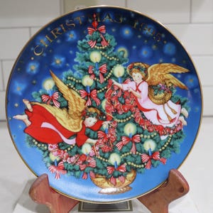 Vintage Avon 22K Gold Trimmed Porcelain Plate Christmas 1995 &quot;Trimming the Tree&quot; Artwork by Peggy Toole Assembled in USA in Original Box.