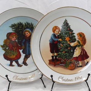 Auswahl an Vintage Porzellan Weihnachtserinnerungen Tellern, die exklusiv für Avon hergestellt wurden